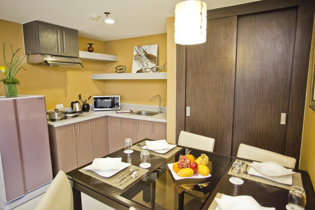 The Exchange Regency Residence Hotel Managed By Hii Pasig City Δωμάτιο φωτογραφία