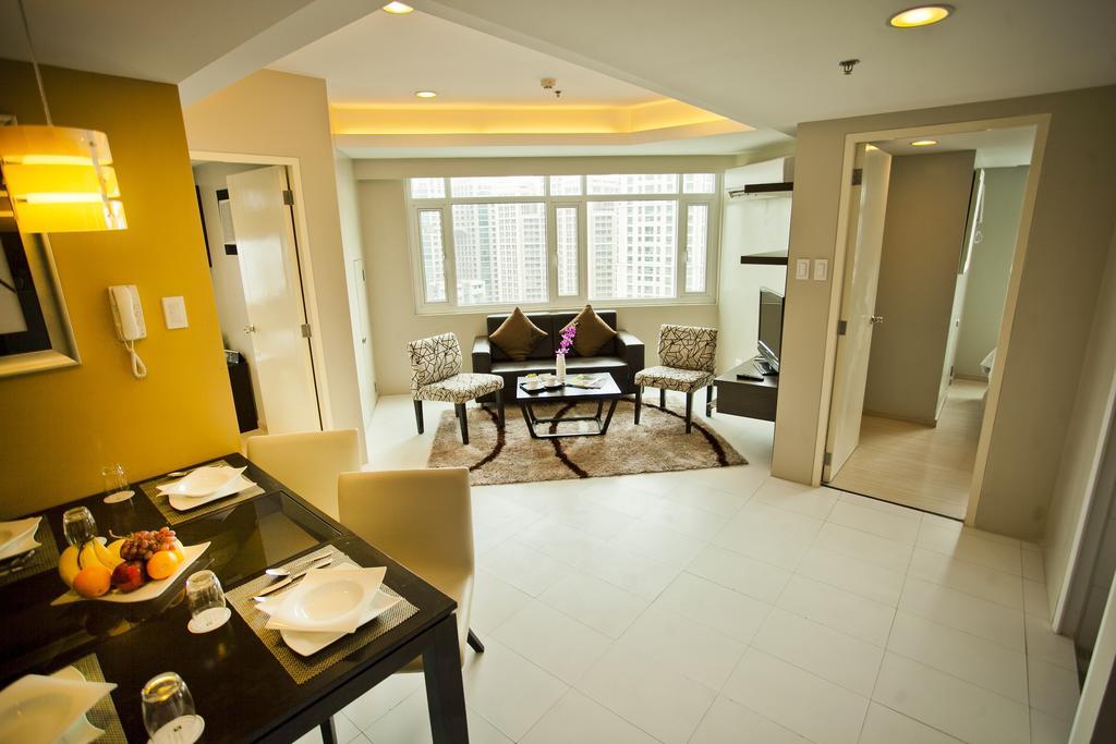 The Exchange Regency Residence Hotel Managed By Hii Pasig City Δωμάτιο φωτογραφία