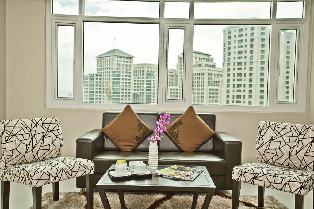 The Exchange Regency Residence Hotel Managed By Hii Pasig City Δωμάτιο φωτογραφία