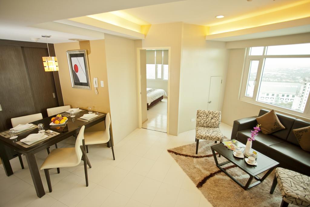 The Exchange Regency Residence Hotel Managed By Hii Pasig City Δωμάτιο φωτογραφία