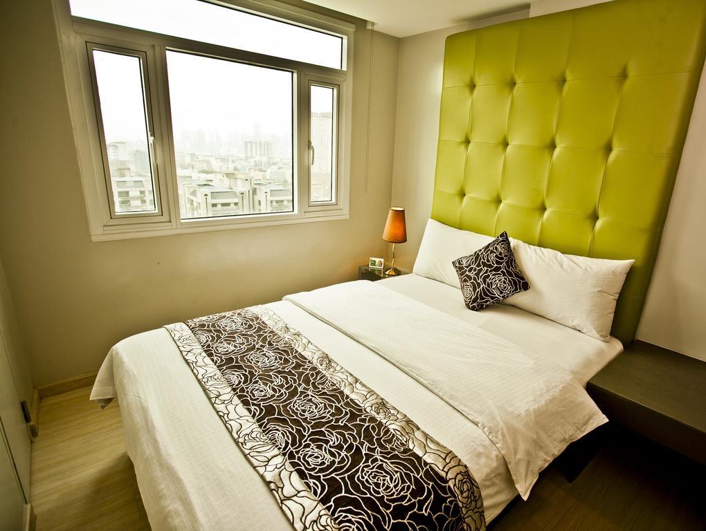 The Exchange Regency Residence Hotel Managed By Hii Pasig City Δωμάτιο φωτογραφία